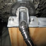 Axle holder, with torque washers engaged