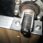Axle holder, with torque washers engaged
