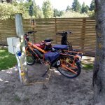 Charging two bikes from caravan plug at Cluth Gold Campsite
