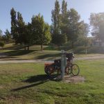 Charging bikes at Omakau Domain Campsite